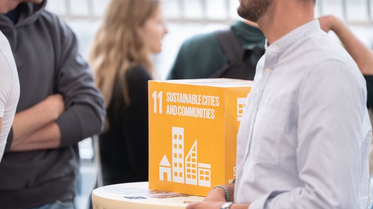 Besucher und Besucherinnen bei der MCI Sustainability Week